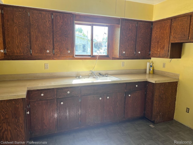 158 W Willow St, Perry, MI 48872 - kitchen featuring a sink and light countertops