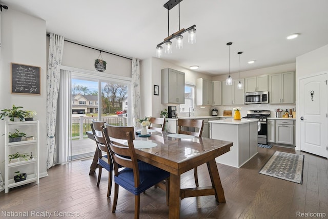 222 Quartz Way, White Lake, MI 48386 - dining area featuring plenty of natural light, recessed lighting, and dark wood finished floors