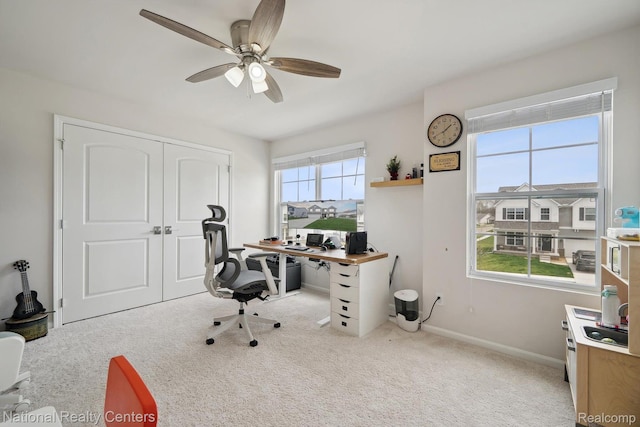 222 Quartz Way, White Lake, MI 48386 - office area with ceiling fan, carpet, and baseboards