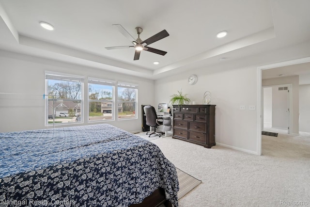 222 Quartz Way, White Lake, MI 48386 - carpeted bedroom with a raised ceiling, baseboards, recessed lighting, and ceiling fan