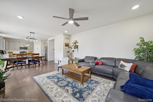 222 Quartz Way, White Lake, MI 48386 - living room featuring ceiling fan, recessed lighting, dark wood-style flooring, and baseboards