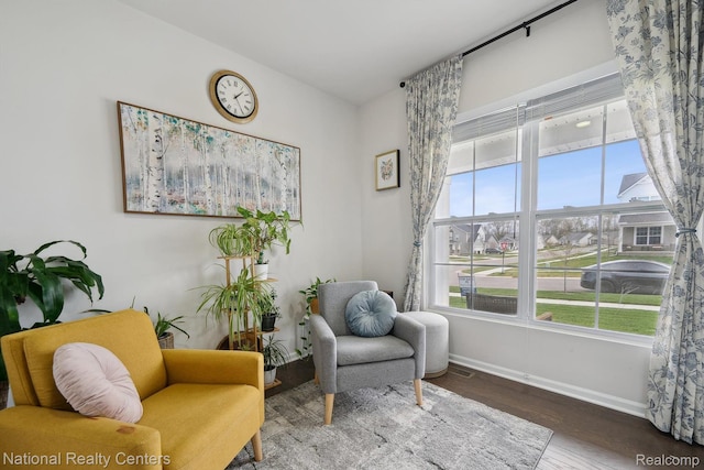 222 Quartz Way, White Lake, MI 48386 - sitting room featuring baseboards and wood finished floors