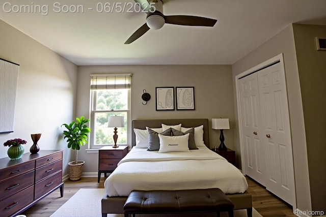 1925 Shepherds Dr, Troy, MI 48084 - bedroom with a closet, wood finished floors, a ceiling fan, and baseboards