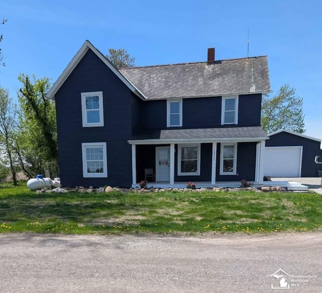 18200 Sherman, Milan, MI 48160 - traditional-style home featuring a porch, an outdoor structure, a chimney, a front yard, and roof with shingles