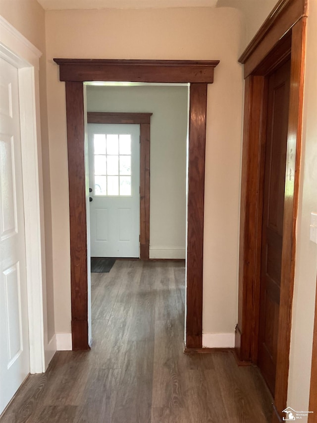 18200 Sherman, Milan, MI 48160 - hall with baseboards and wood finished floors