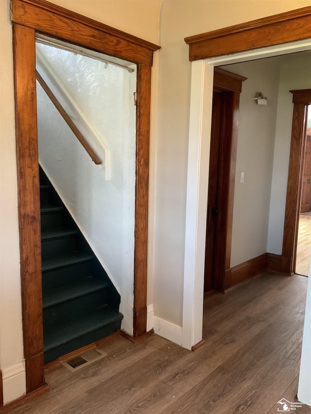 18200 Sherman, Milan, MI 48160 - stairway featuring wood finished floors and baseboards