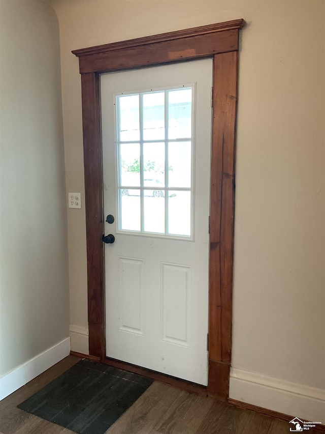 18200 Sherman, Milan, MI 48160 - doorway with baseboards and wood finished floors