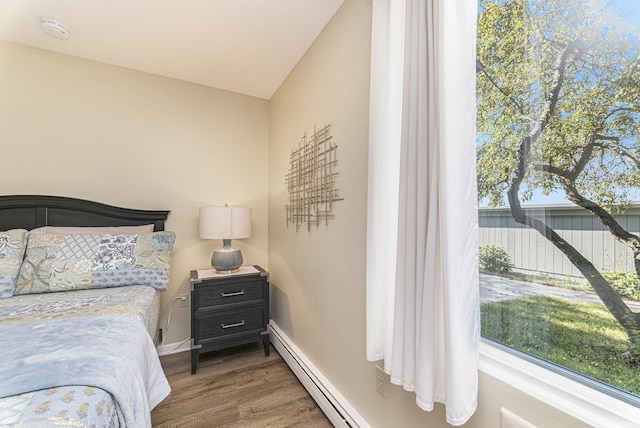 5737 Hilltop Way, Williamsburg, MI 49690 - bedroom featuring wood finished floors and baseboards