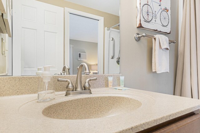 5737 Hilltop Way, Williamsburg, MI 49690 - full bath featuring vanity and curtained shower