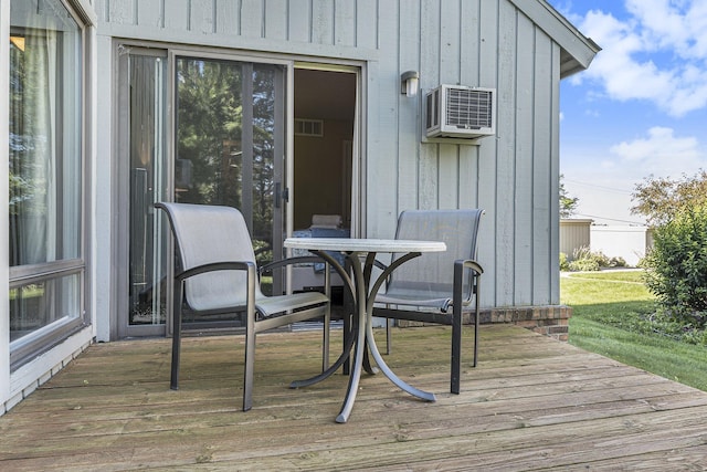 5737 Hilltop Way, Williamsburg, MI 49690 - deck featuring a wall mounted AC and a yard