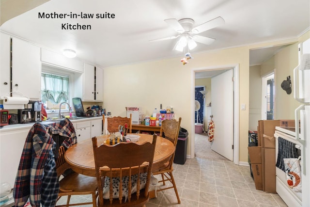 111 Greenleaf St, Onsted, MI 49265 - dining area featuring a ceiling fan and crown molding