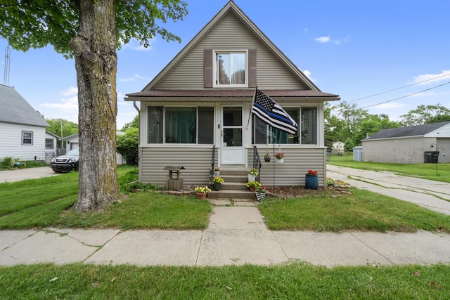 111 Greenleaf St, Onsted, MI 49265 - view of front of property featuring entry steps and a front yard