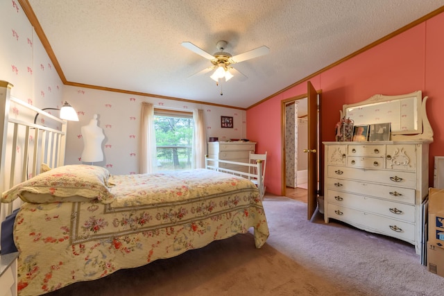8279 Luce St, Alanson, MI 49706 - bedroom with ornamental molding, a textured ceiling, carpet, ceiling fan, and vaulted ceiling