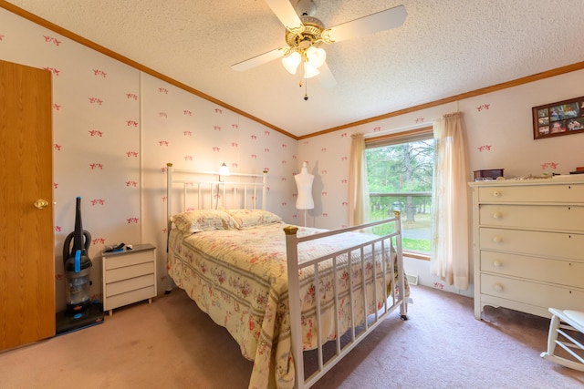 8279 Luce St, Alanson, MI 49706 - carpeted bedroom featuring ornamental molding, lofted ceiling, a textured ceiling, and a ceiling fan