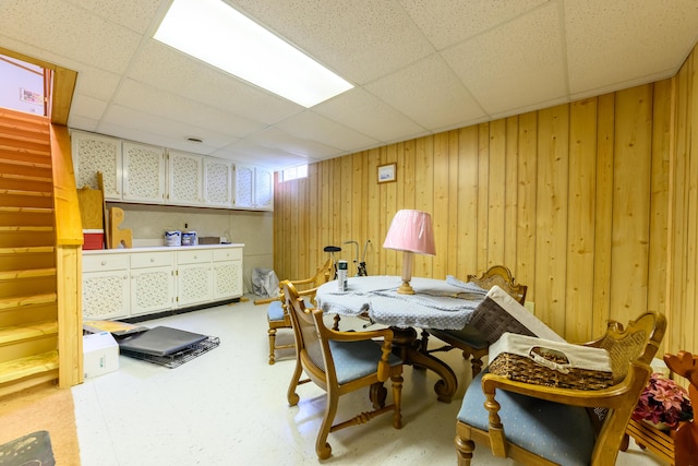 8279 Luce St, Alanson, MI 49706 - home office with a paneled ceiling and wooden walls
