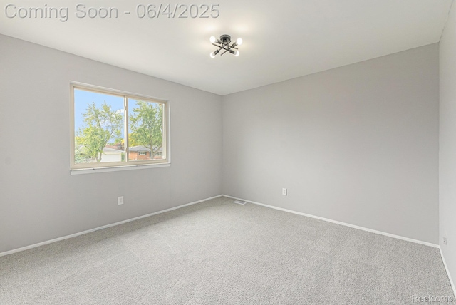 4325 Fox Hill Dr, Sterling Heights, MI 48310 - carpeted empty room with baseboards