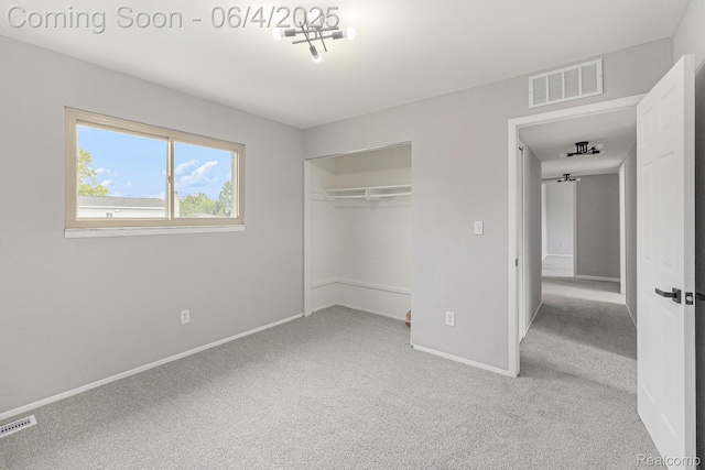 4325 Fox Hill Dr, Sterling Heights, MI 48310 - unfurnished bedroom featuring carpet, baseboards, and a closet
