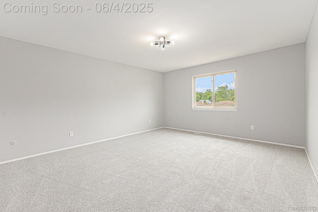 4325 Fox Hill Dr, Sterling Heights, MI 48310 - carpeted empty room featuring baseboards