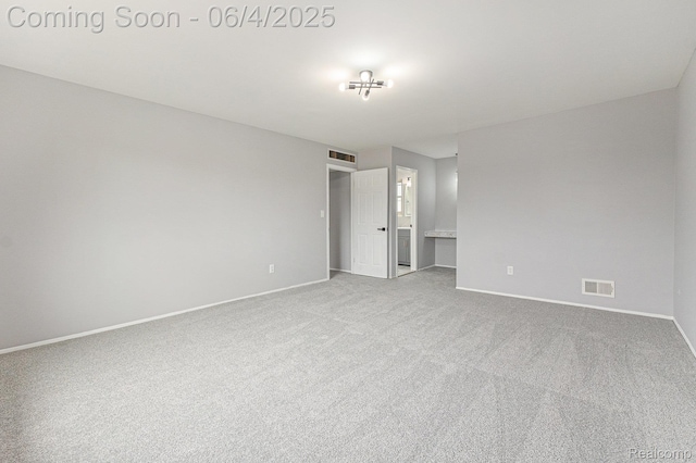 4325 Fox Hill Dr, Sterling Heights, MI 48310 - unfurnished bedroom featuring baseboards, carpet, and ensuite bath