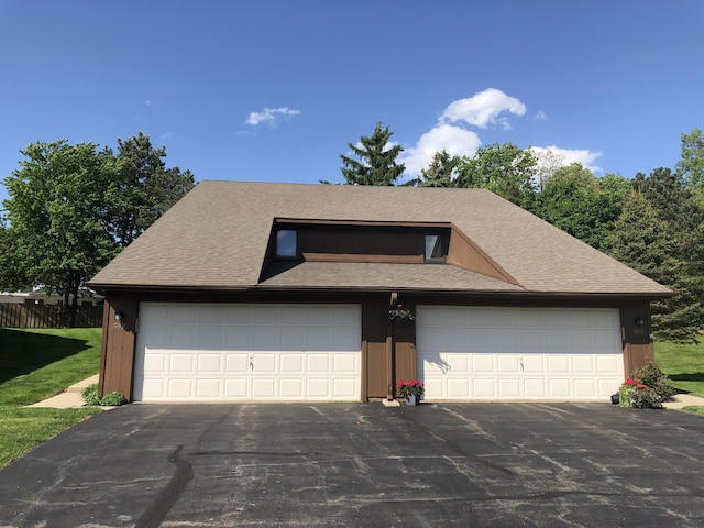 599 Echo Ct, Saline, MI 48176 - view of front of home featuring roof with shingles