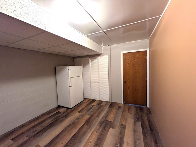 599 Echo Ct, Saline, MI 48176 - finished basement featuring freestanding refrigerator and dark wood-style flooring