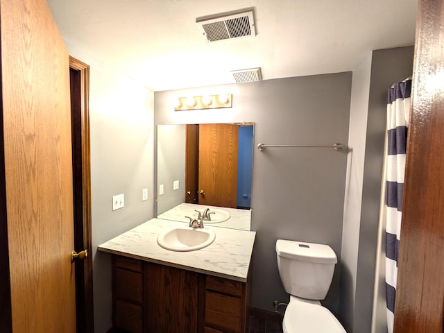 599 Echo Ct, Saline, MI 48176 - bathroom with toilet, vanity, and a shower with curtain