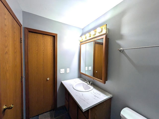 599 Echo Ct, Saline, MI 48176 - bathroom with vanity and toilet