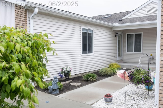828 Crystal Ln, Marysville, MI 48040 - view of property exterior featuring roof with shingles