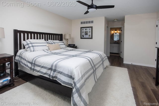 828 Crystal Ln, Marysville, MI 48040 - bedroom featuring dark wood-type flooring, baseboards, a ceiling fan, and ensuite bathroom