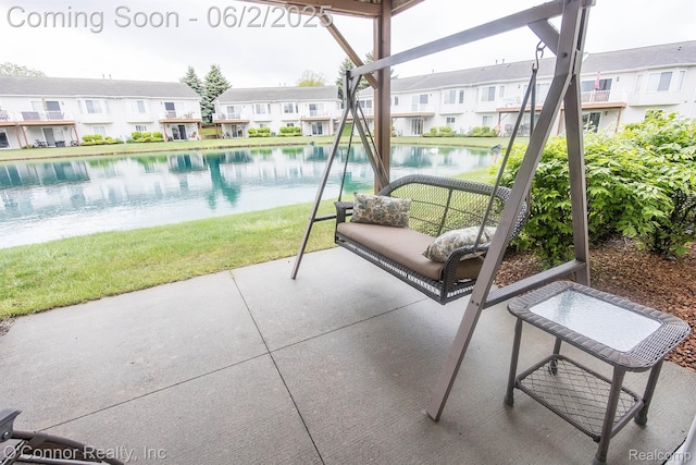828 Crystal Ln, Marysville, MI 48040 - view of patio featuring a water view and a residential view