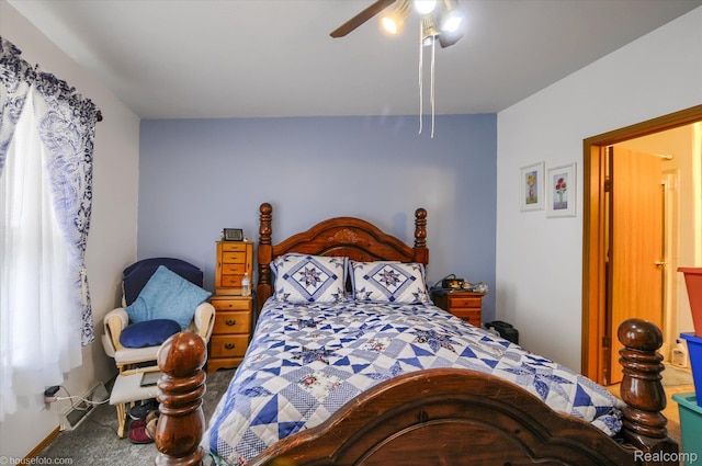 355 Carpenter Rd, Fostoria, MI 48435 - bedroom with carpet floors, ceiling fan, and baseboards
