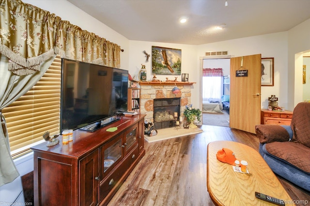355 Carpenter Rd, Fostoria, MI 48435 - living area with wood finished floors and a fireplace