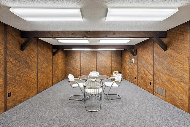 6130 Eidson Rd, Saint Joseph, MI 49085 - finished below grade area featuring wood walls and carpet