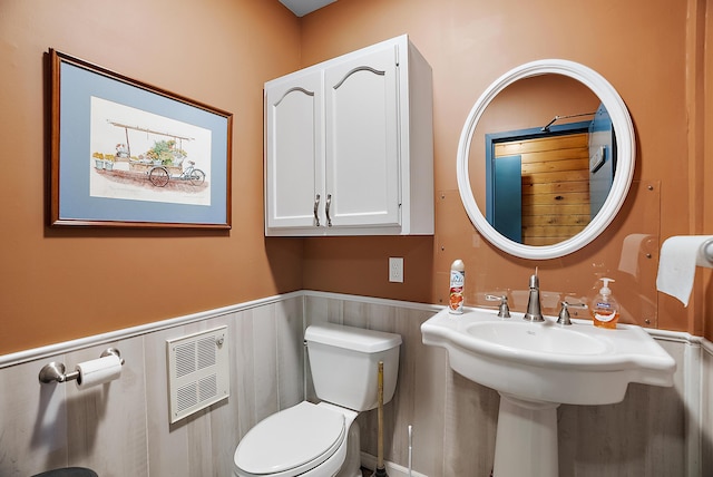 6130 Eidson Rd, Saint Joseph, MI 49085 - half bathroom featuring wainscoting and toilet