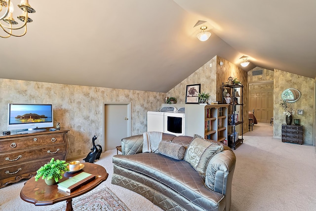 6130 Eidson Rd, Saint Joseph, MI 49085 - living area featuring carpet floors, vaulted ceiling, washing machine and dryer, and a chandelier