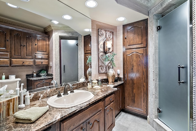 6130 Eidson Rd, Saint Joseph, MI 49085 - full bath with vanity, crown molding, a stall shower, and recessed lighting