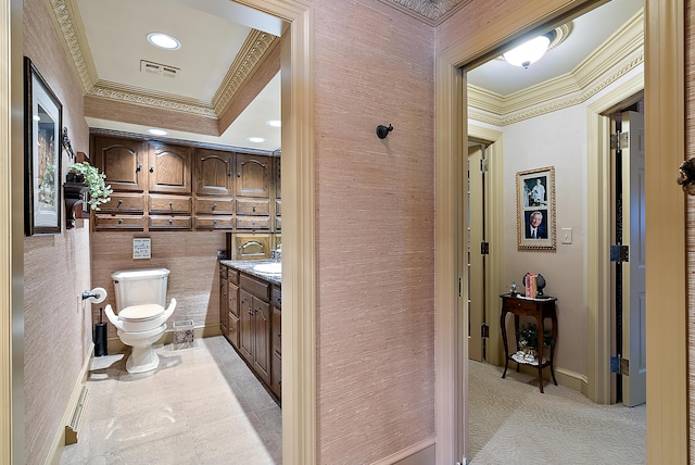 6130 Eidson Rd, Saint Joseph, MI 49085 - bathroom with crown molding, toilet, vanity, and recessed lighting