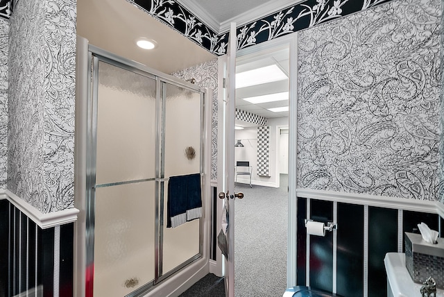 6130 Eidson Rd, Saint Joseph, MI 49085 - bathroom with a stall shower, crown molding, and wallpapered walls