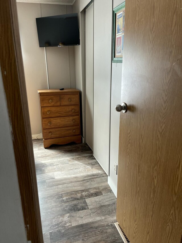 11064 S Hulbert Rd, Hulbert, MI 49748 - bedroom with wood finished floors