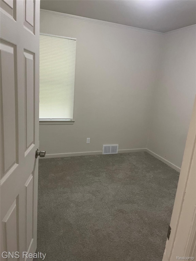 14275 Young St, Detroit, MI 48205 - carpeted empty room featuring crown molding and baseboards