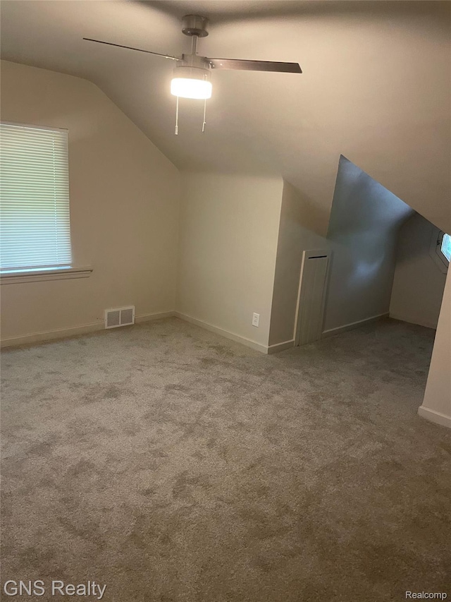 14275 Young St, Detroit, MI 48205 - bonus room featuring vaulted ceiling, carpet flooring, a ceiling fan, and baseboards