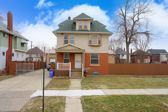 719 Webb St, Detroit, MI 48202 - american foursquare style home with covered porch, brick siding, roof with shingles, a residential view, and a chimney
