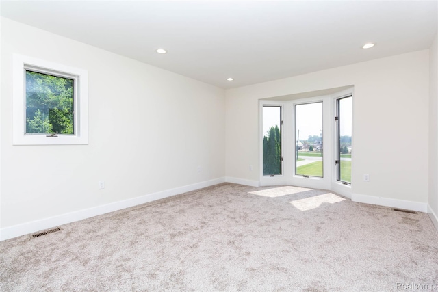 56259 Schoenherr Rd, Shelby Twp, MI 48315 - unfurnished room with healthy amount of natural light, carpet floors, baseboards, and recessed lighting