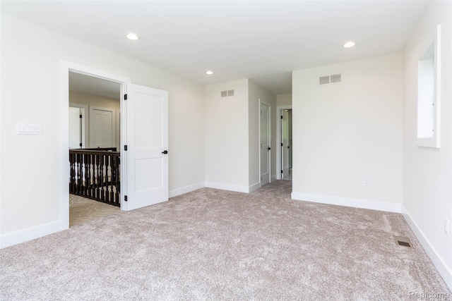 56259 Schoenherr Rd, Shelby Twp, MI 48315 - carpeted empty room featuring baseboards and recessed lighting