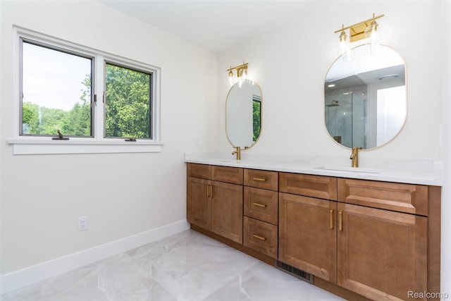 56259 Schoenherr Rd, Shelby Twp, MI 48315 - full bath with double vanity, marble finish flooring, a shower stall, and baseboards