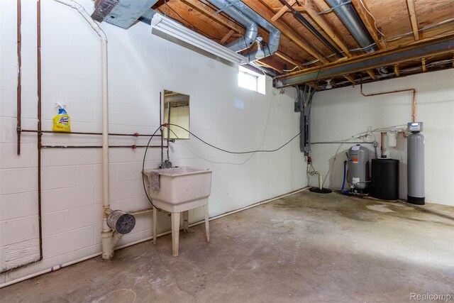 56259 Schoenherr Rd, Shelby Twp, MI 48315 - below grade area featuring a water softener system and concrete block wall