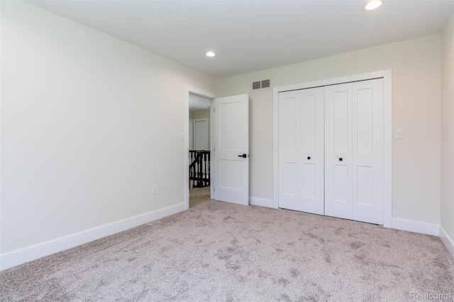 56259 Schoenherr Rd, Shelby Twp, MI 48315 - unfurnished bedroom featuring carpet, baseboards, recessed lighting, and a closet