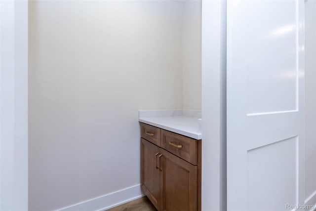 56259 Schoenherr Rd, Shelby Twp, MI 48315 - bathroom with baseboards and vanity