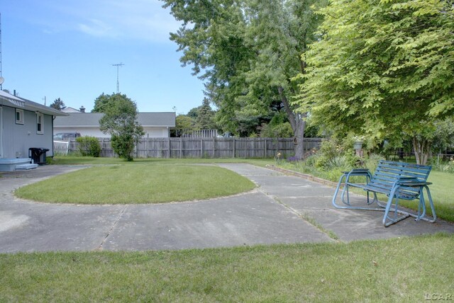 2683 Elmwood Dr, Adrian, MI 49221 - view of yard featuring a patio