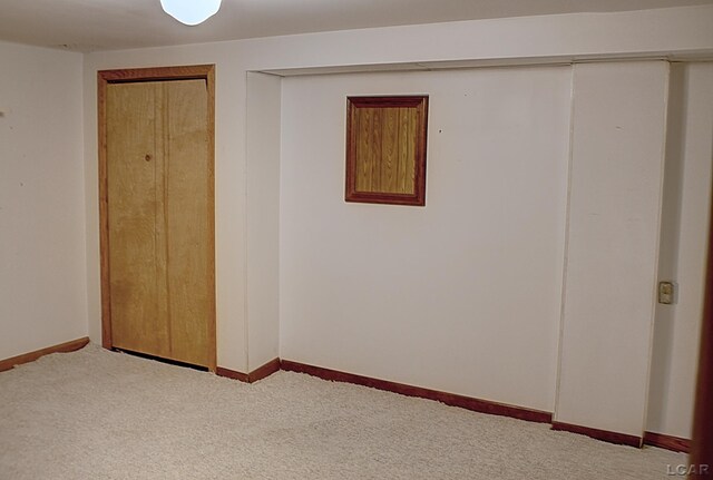 2683 Elmwood Dr, Adrian, MI 49221 - unfurnished bedroom with carpet flooring and baseboards